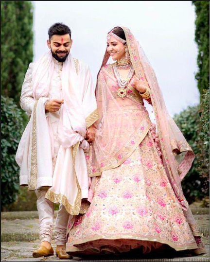 Virat Kohli and Anushka Sharma wedding picture on DateTheRamp website. Courtesy Sabyasachi.